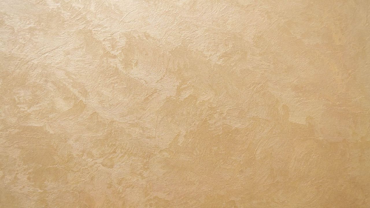 Beige textured wall background