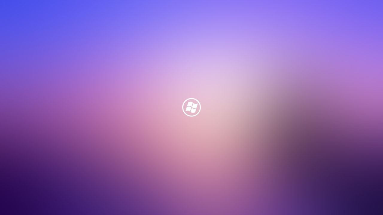 Windows logo on a blurry gradient background