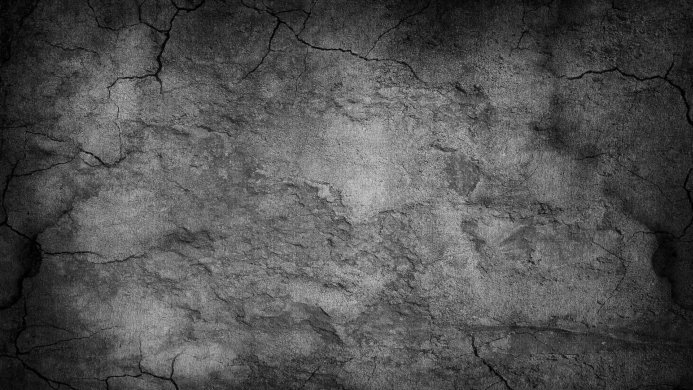 Grunge concrete wall texture in gray and black tones