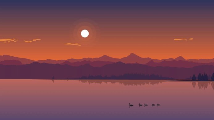 Sunset over a lake with mountains and ducks