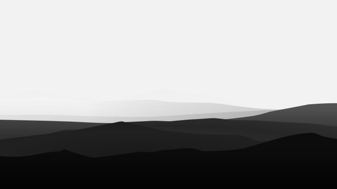 Monochrome mountain range landscape with layered silhouettes