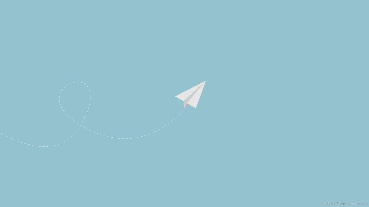 White paper airplane flying in blue sky with trail