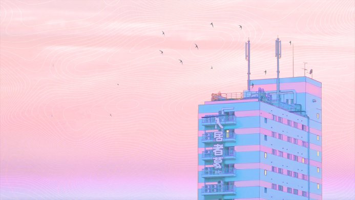 Pastel colored building with visible antennas against a pink sky with birds
