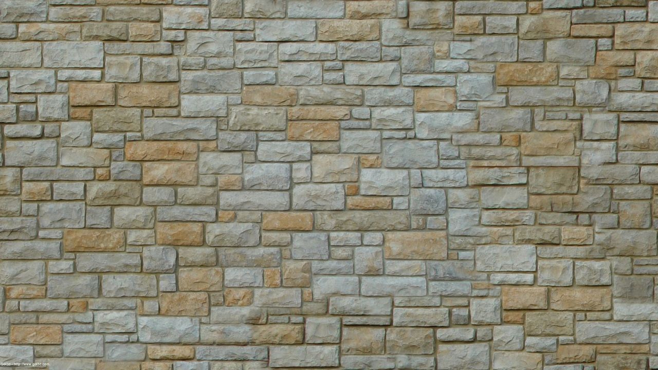 Texture of a stone wall with varied shapes and colors
