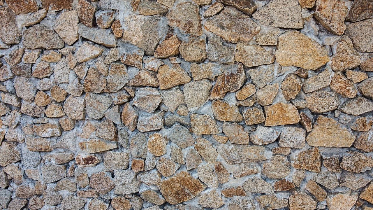 Rough stone wall texture background pattern