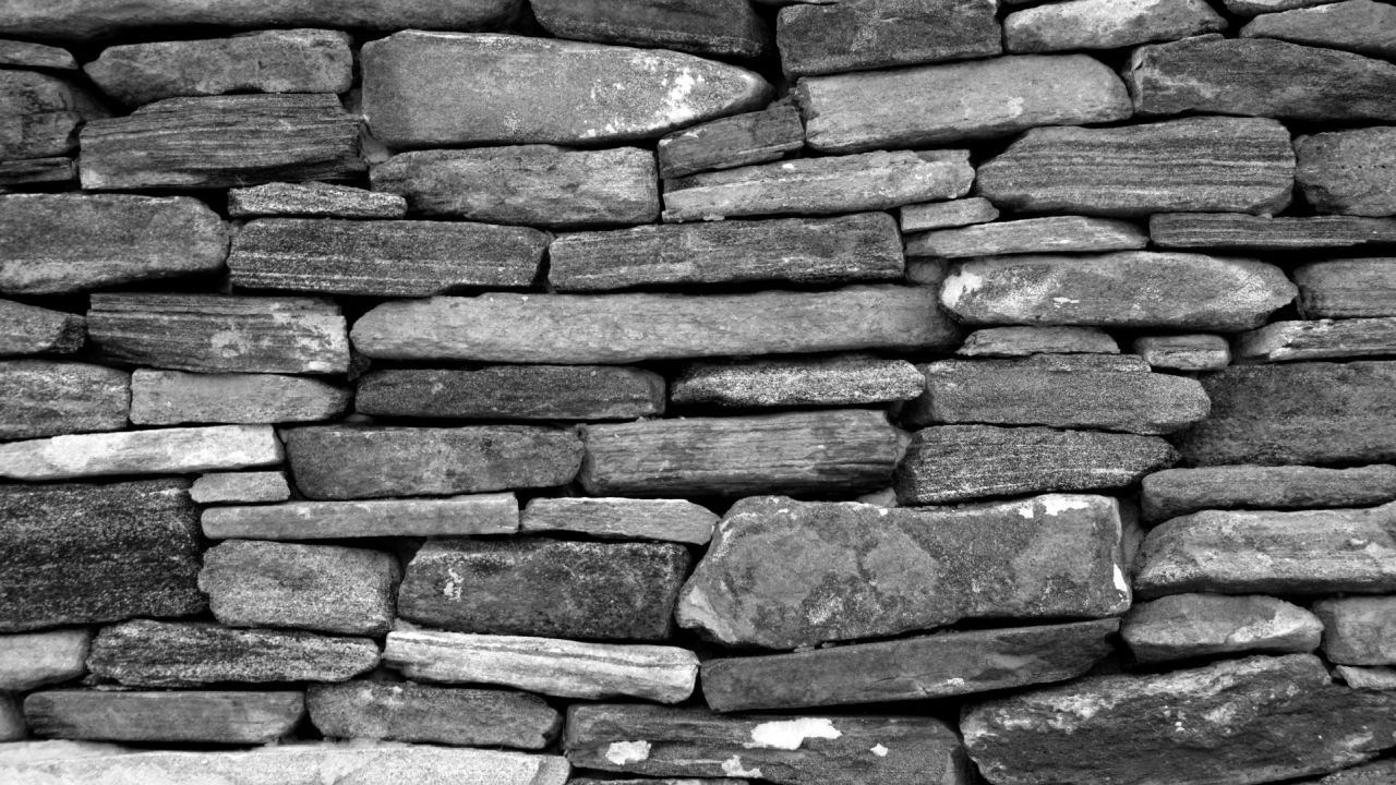 Black and white close up texture of a stone wall