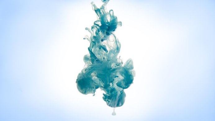 Teal ink cloud in white and light blue gradient background