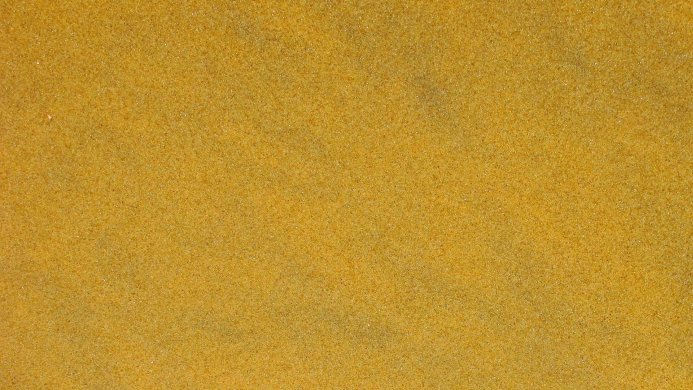 Close-up of yellow foam texture