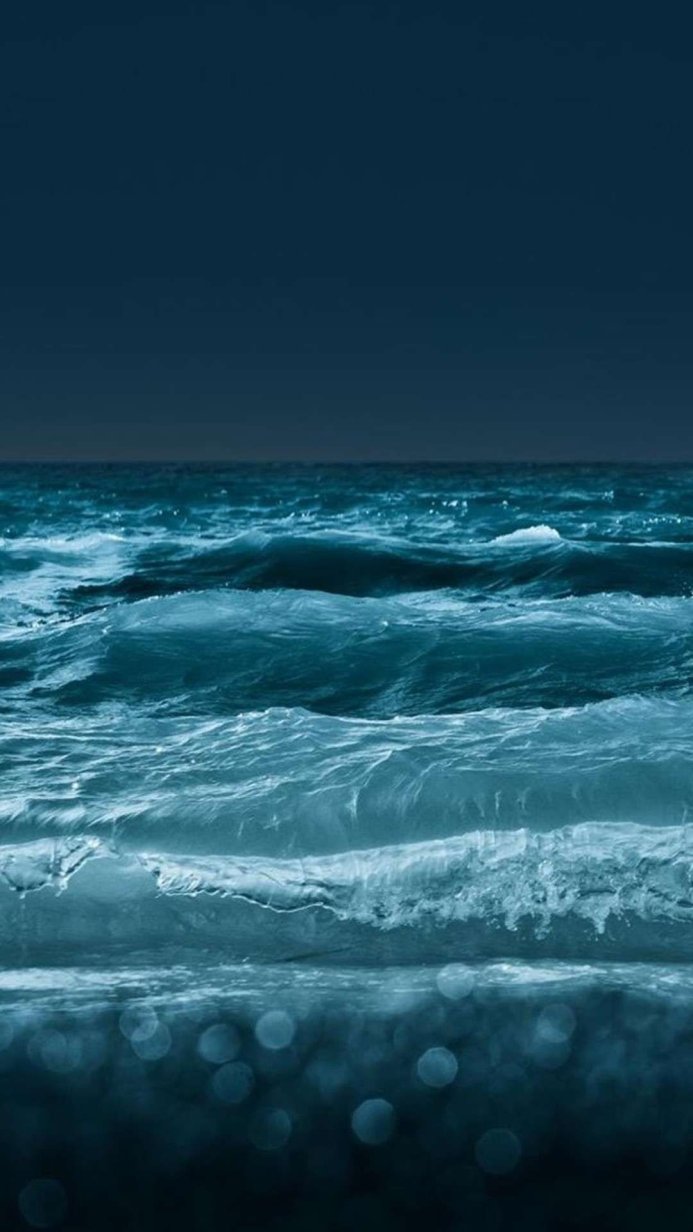 Waves on the water surface in shades of blue