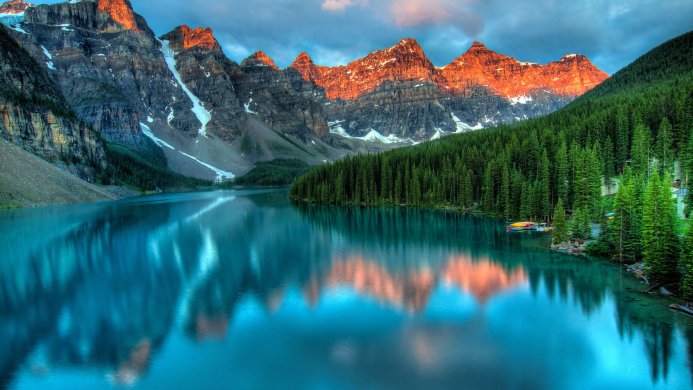 Moraine Lake, Alberta, Canada, reflecting mountains and forest