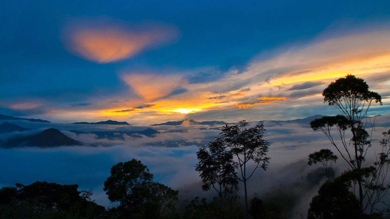 Sunrise over mountains and clouds
