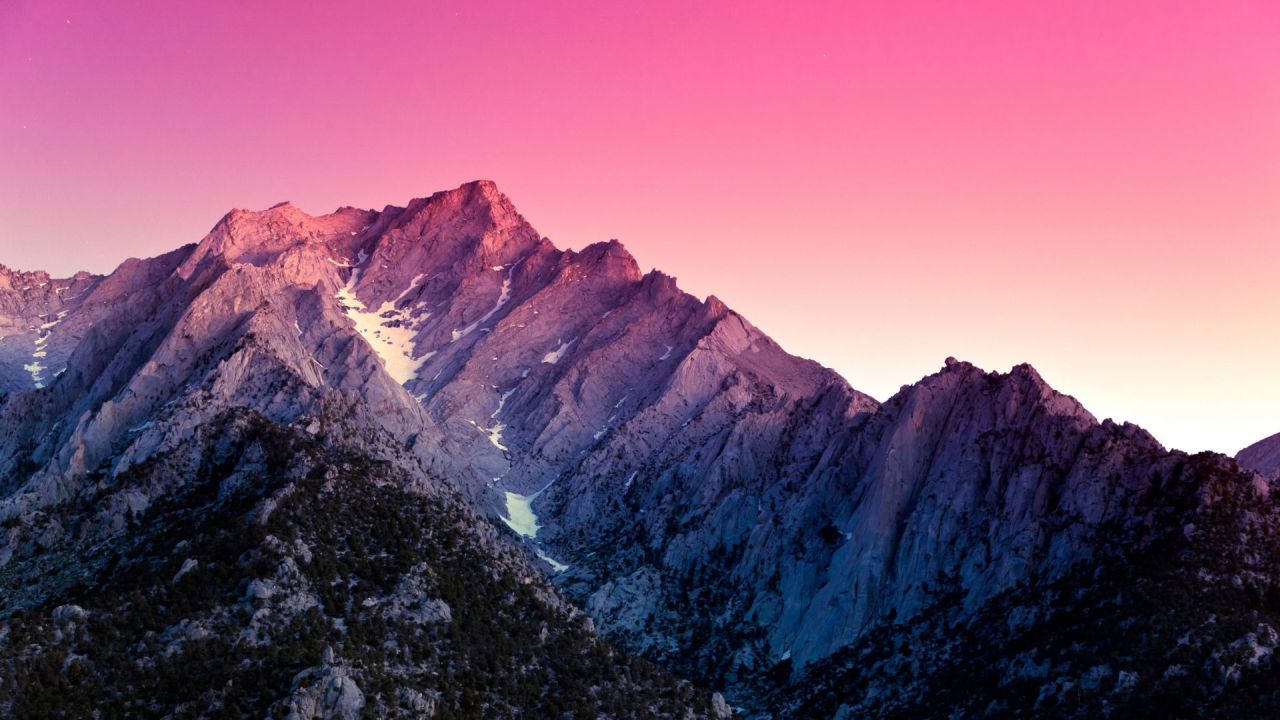 Mountain range with a pink sky