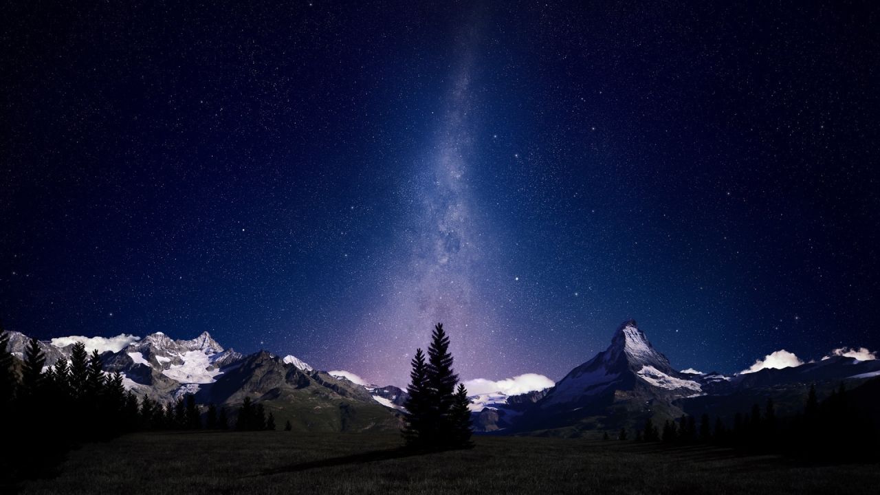 Matterhorn mountain under stars at night