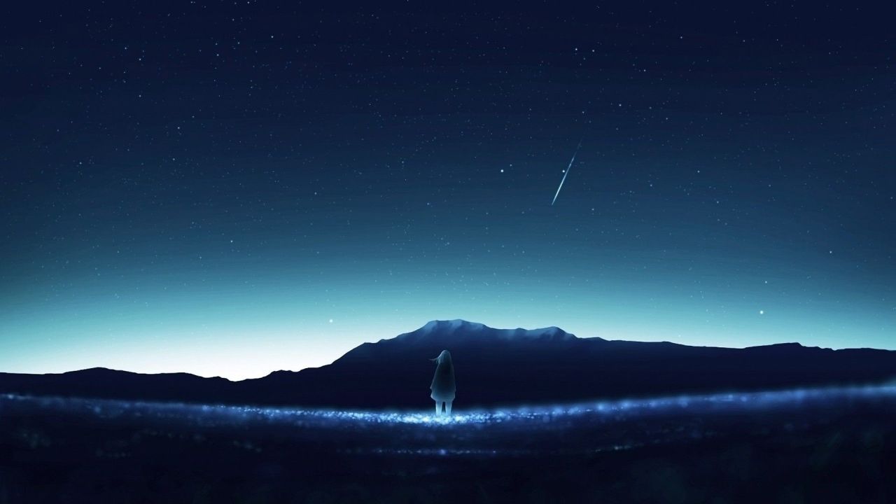 Person under a starry sky