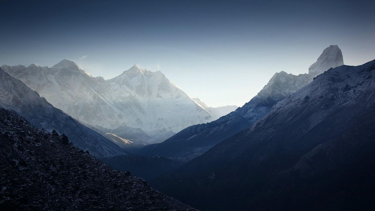 Snowy mountain peaks under a clear sky