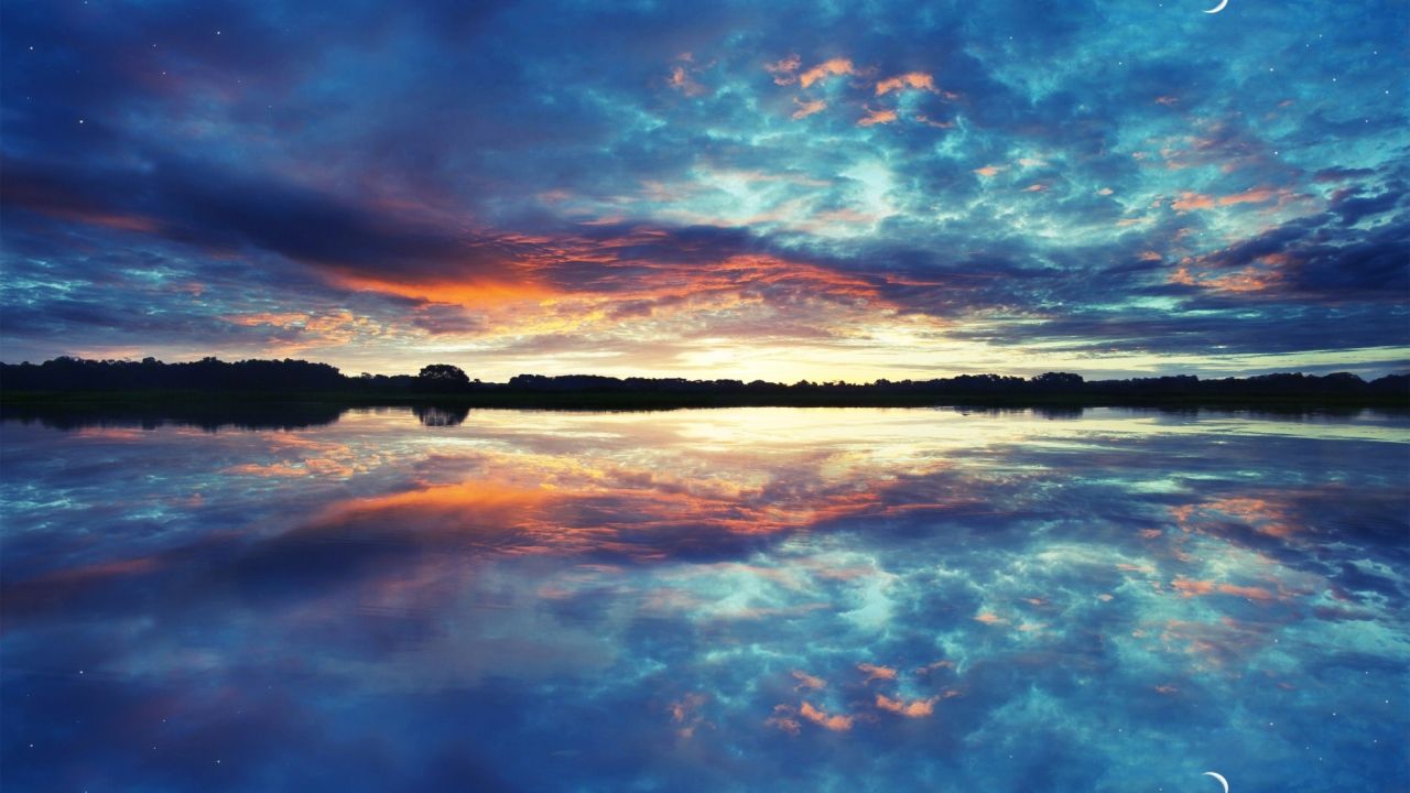 Colorful sky reflected in water
