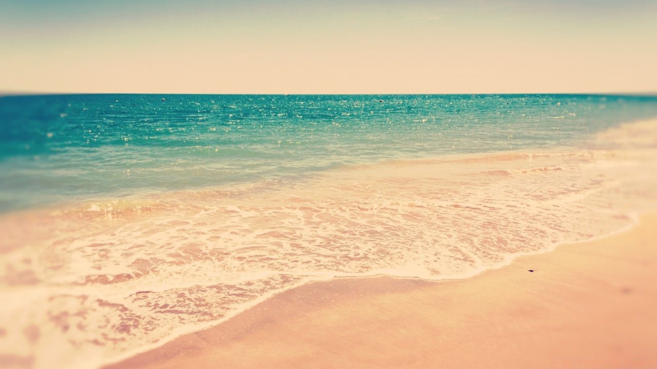 Sea beach with soft waves