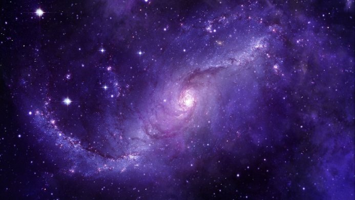 A vibrant spiral galaxy with bright stars and a purple and blue hue