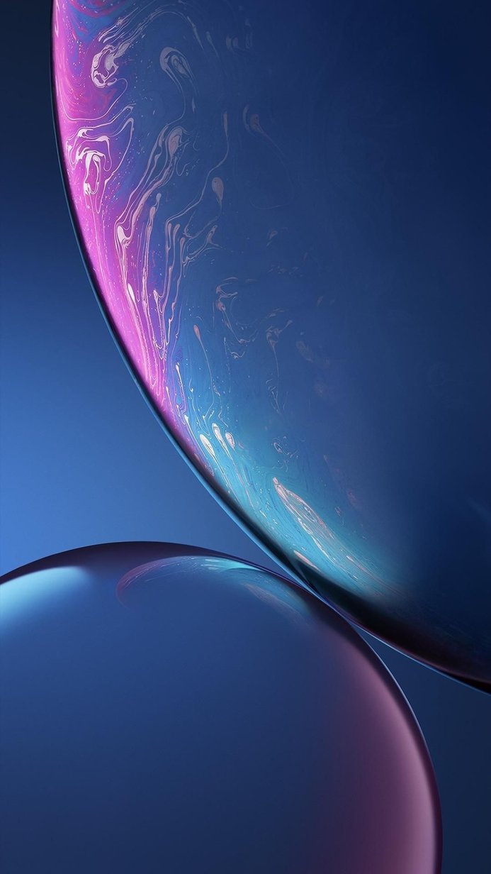 Abstract background with blue, purple, and pink fluid textures forming spherical shapes