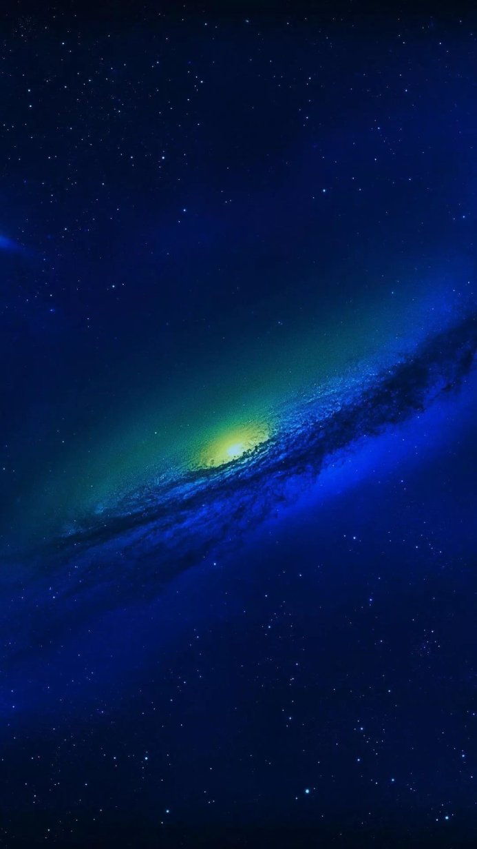A stunning view of a galaxy with a bright yellow core amidst a blue nebula and scattered stars