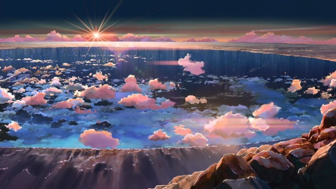Cliffs and clouds at sunrise, with blue and orange hues, capturing a peaceful landscape