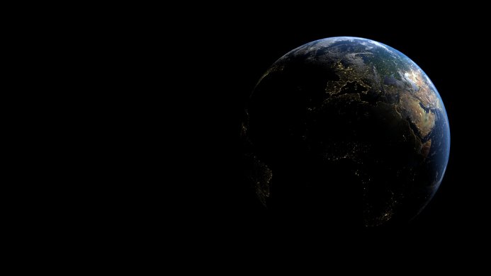 A view of Earth from space at night, showing city lights