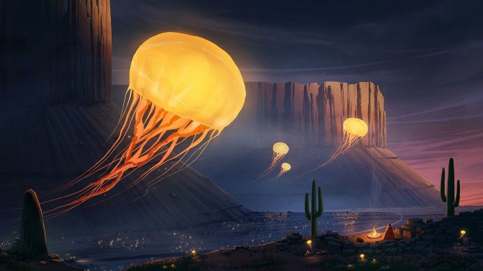Glowing jellyfish floating over a desert landscape at night