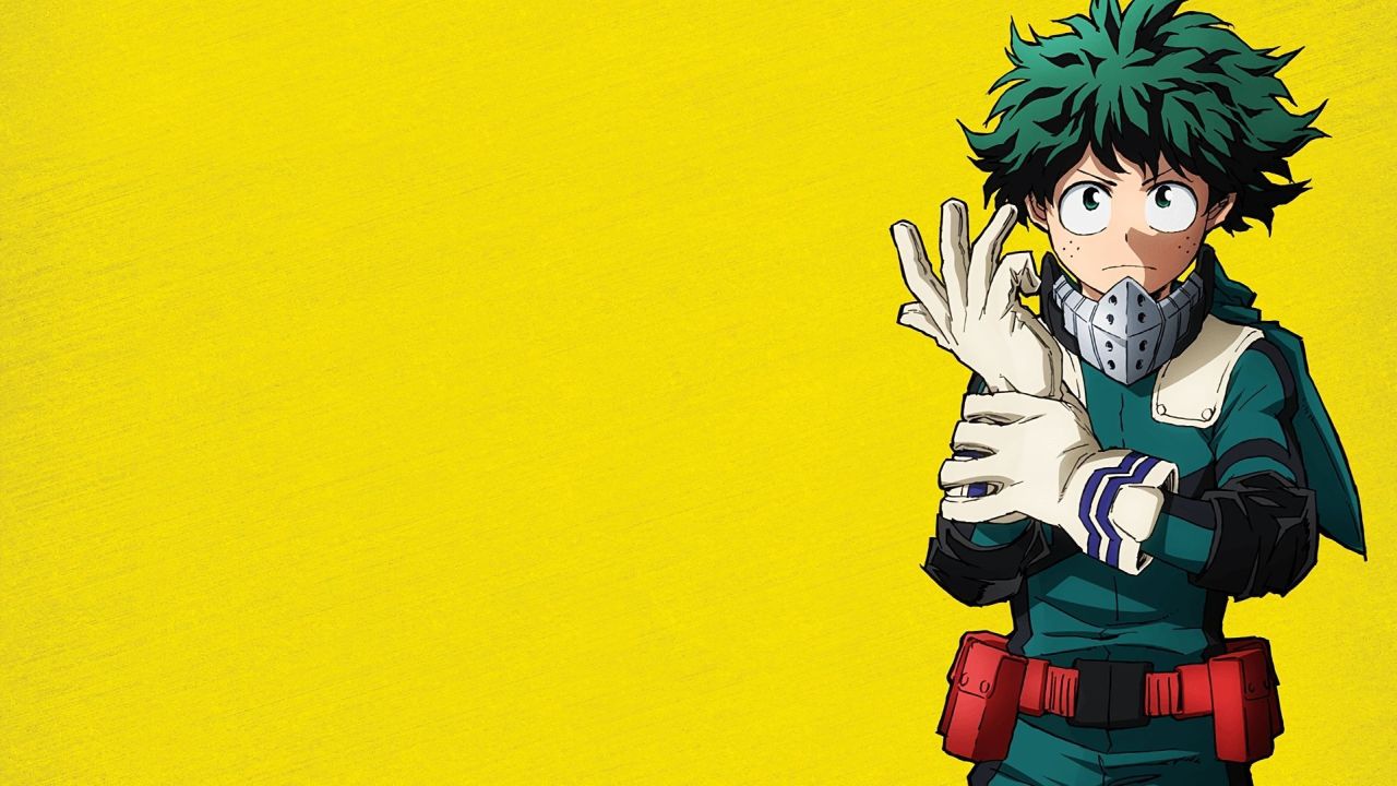 Izuku Midoriya adjusting gloves in hero costume yellow background