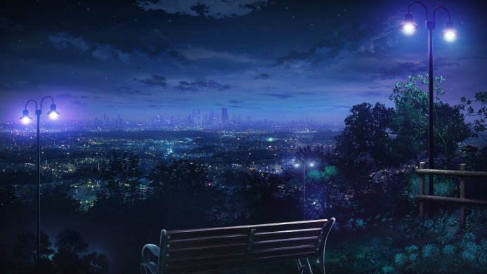 Night cityscape with glowing city lights, a bench and a lamppost in the foreground