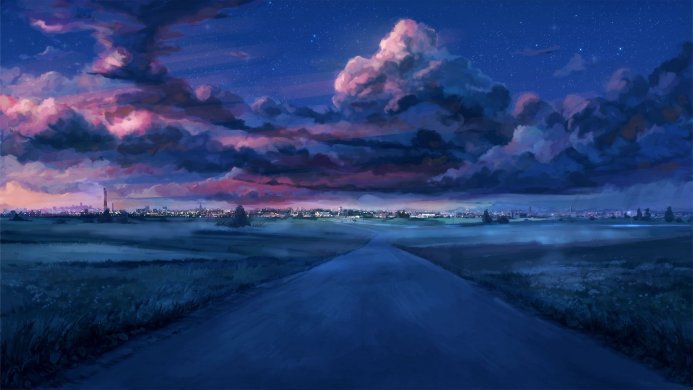 A road leading towards a city at night under a sky filled with clouds and stars