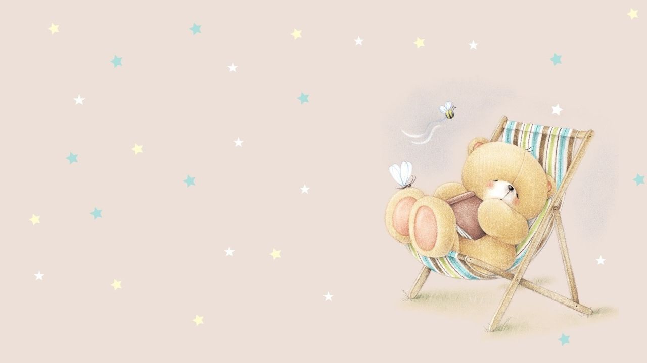 Cute teddy bear sleeping in a deck chair holding a book