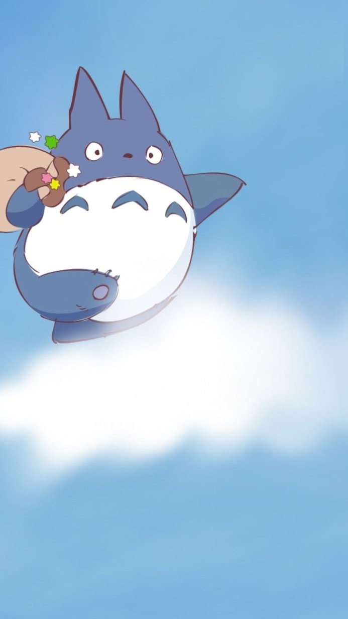 Totoro flying in the sky, holding a small gift with stars and a flower