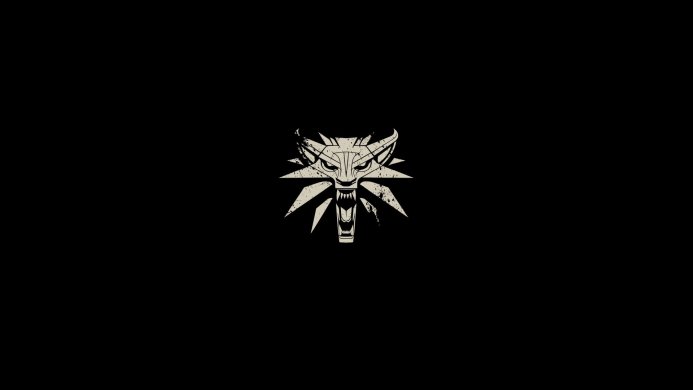 The Witcher wolf medallion on a black background