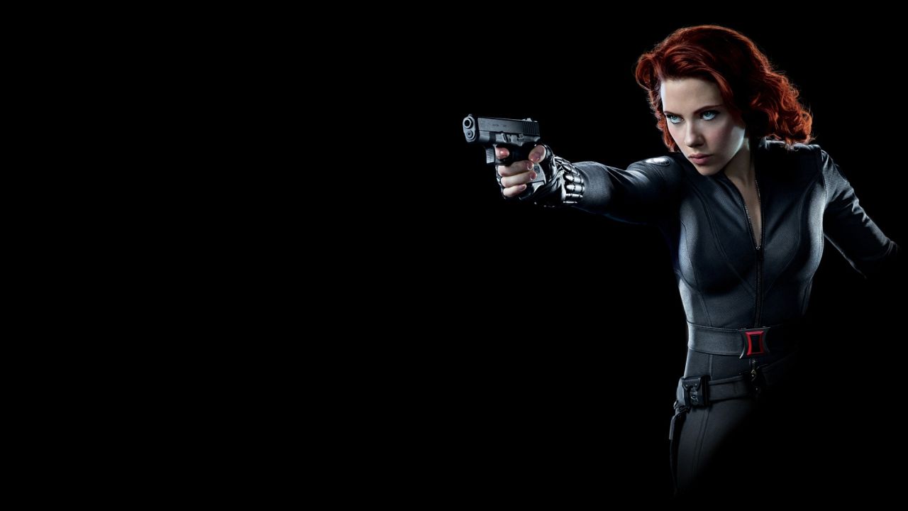 Black Widow with a gun in black suit