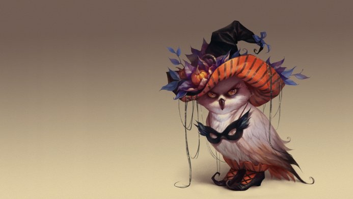 An owl wearing a witch hat and holding a masquerade mask