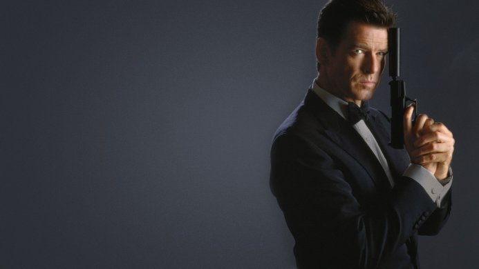 Pierce Brosnan as James Bond holding a gun, serious expression