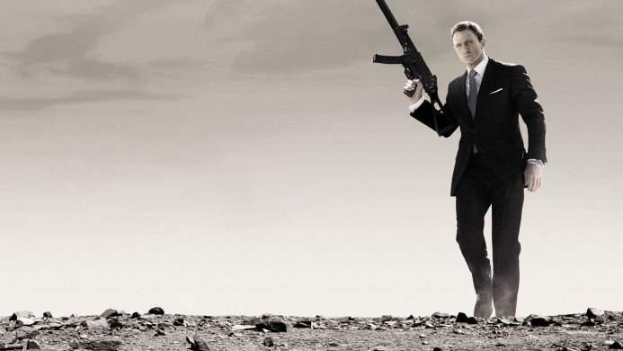 James Bond in Skyfall holding a rifle, wearing a suit in a desaturated environment