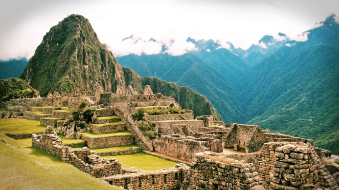Machu Picchu ruins with mountains in the background