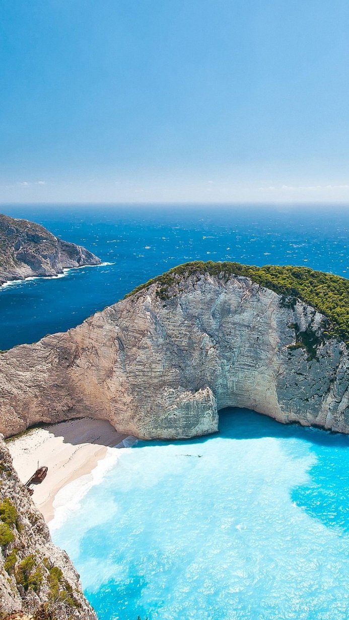 Navagio beach, Zakynthos, Greece with shipwreck on the white sand beach and turquoise water