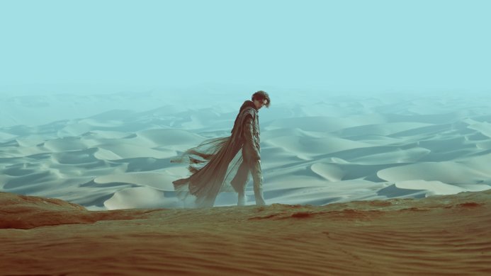 Paul Atreides walks across the desert in Dune
