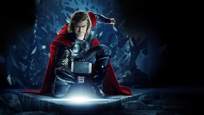 Thor, the Marvel superhero, kneeling with his hammer, Mjolnir