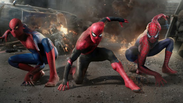Three Spider-Man variants crouched in front of debris