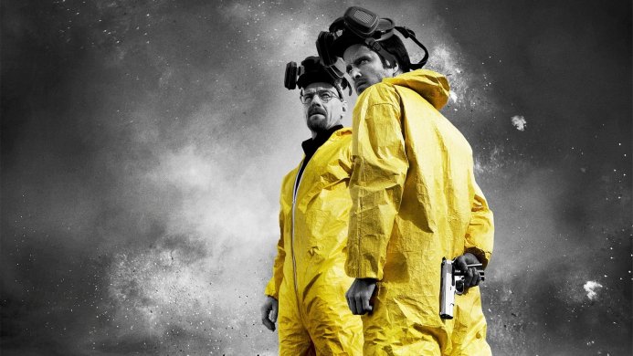 Walter White and Jesse Pinkman from Breaking Bad wearing yellow suits and gas masks