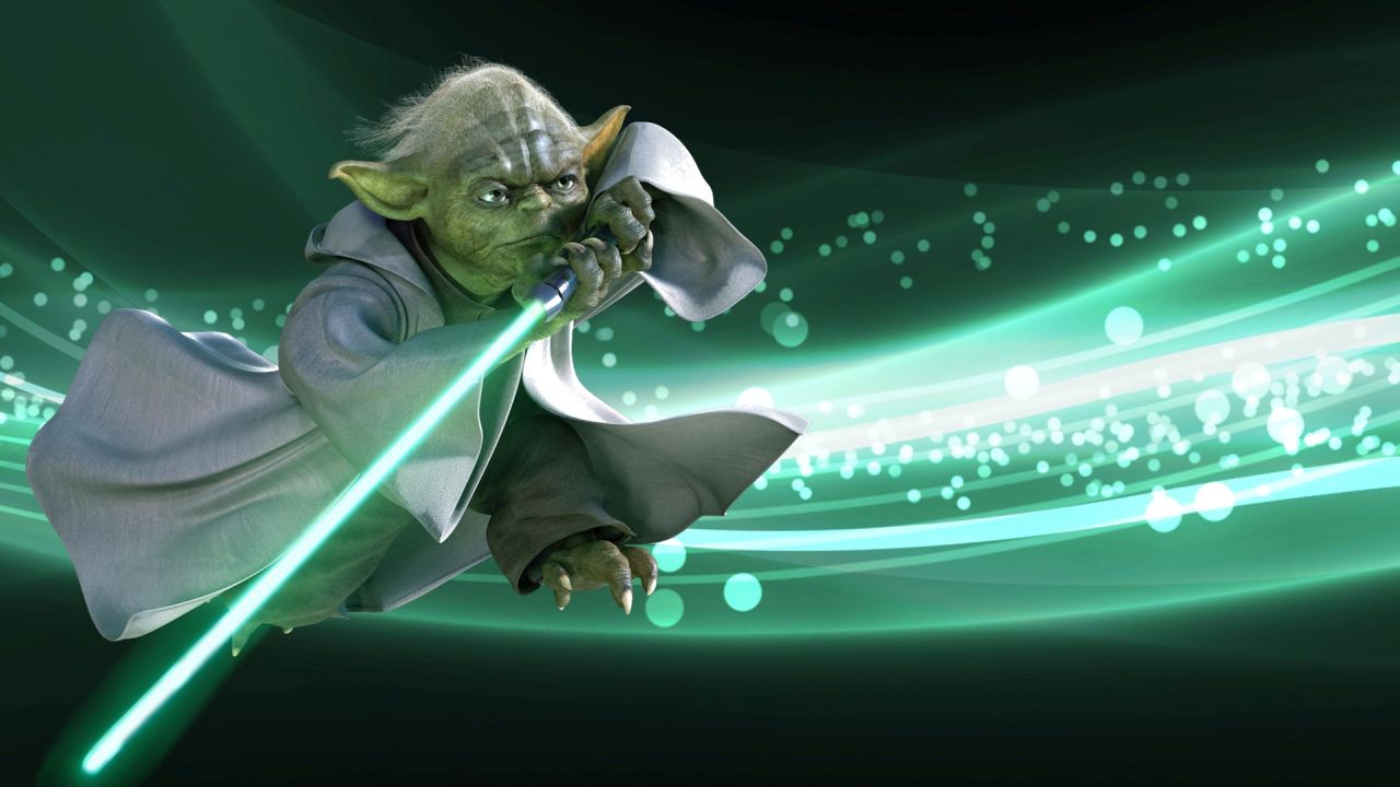 Yoda wielding a lightsaber
