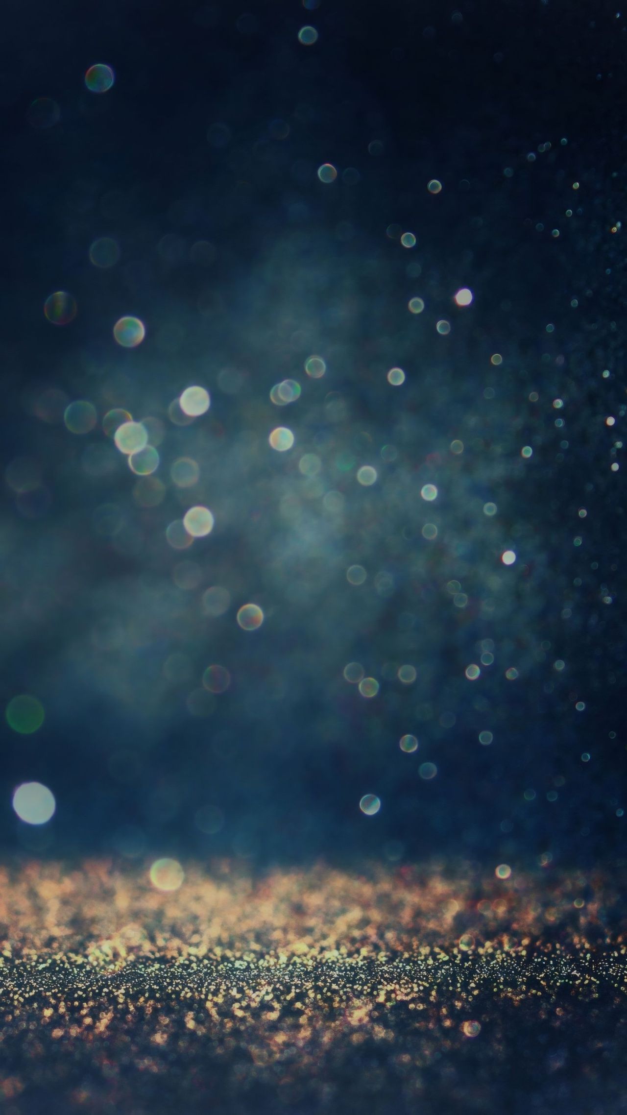 Glittering abstract background with bokeh lights