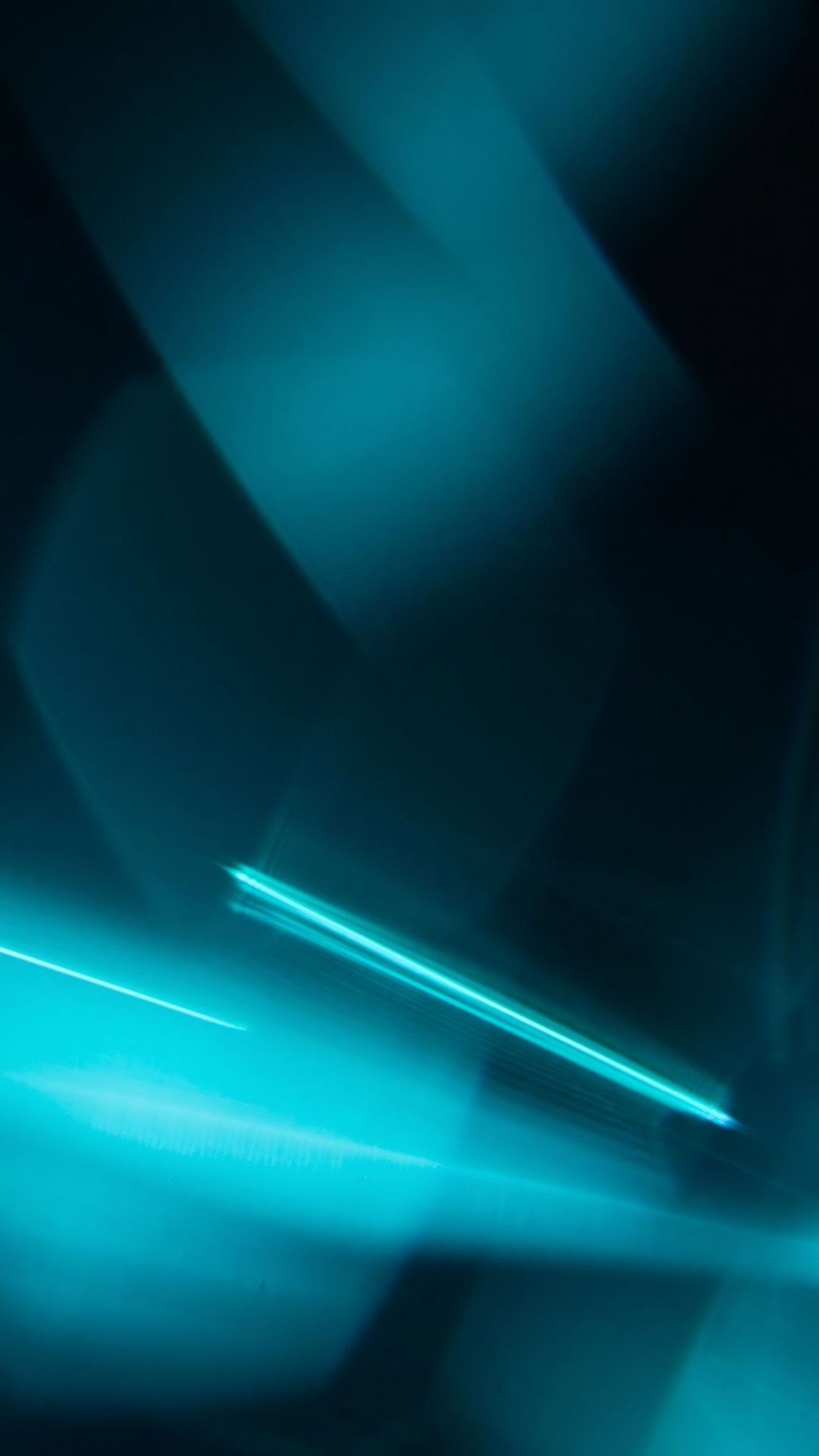 Abstract blue light streaks on dark background