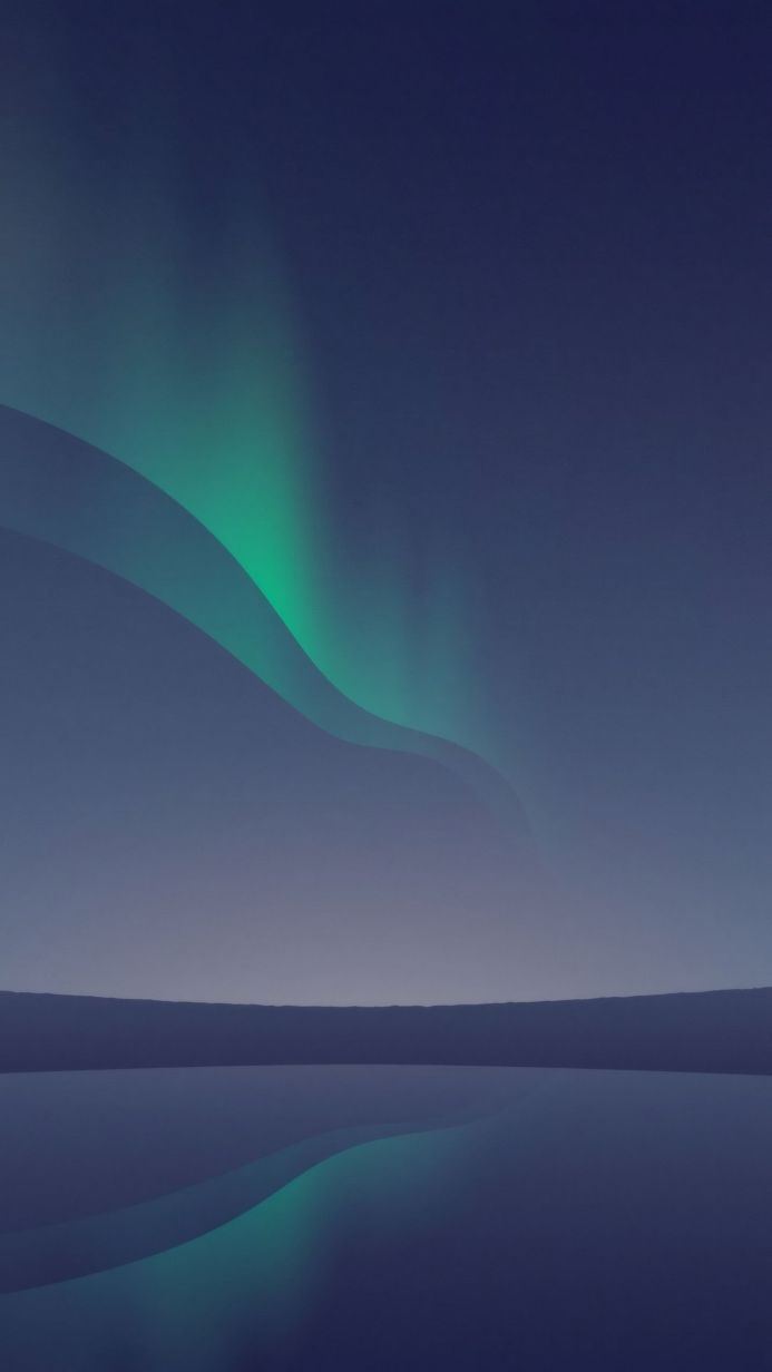 Aurora borealis reflecting in water under a night sky