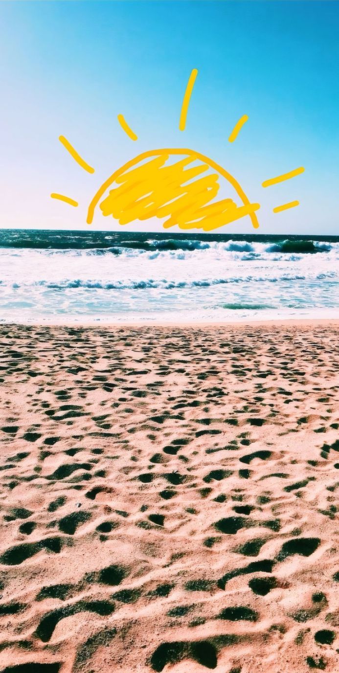 A sunny beach scene with waves gently lapping at the shore and a hand-drawn sun in the sky