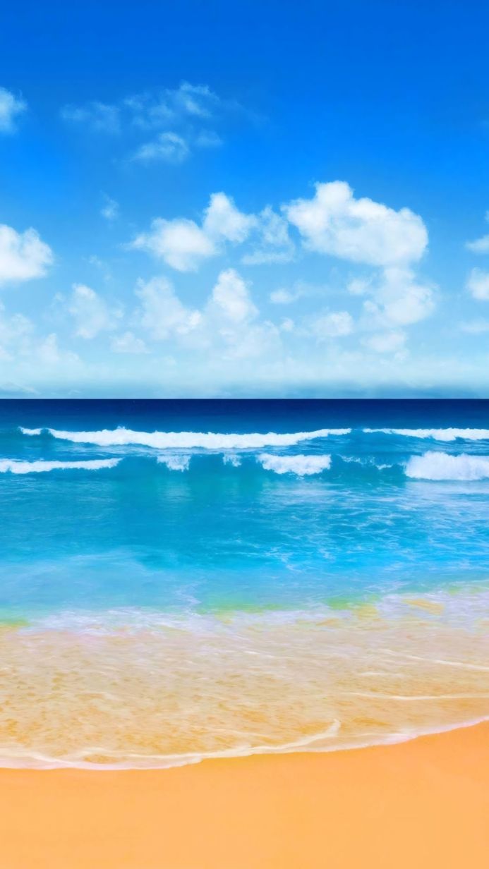 Seascape with turquoise water, sea waves, yellow sand, and a blue sky with clouds