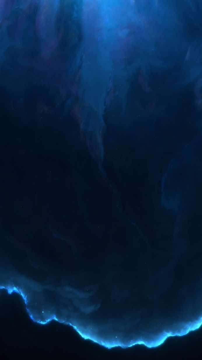 A blue nebula in deep space with twinkling stars